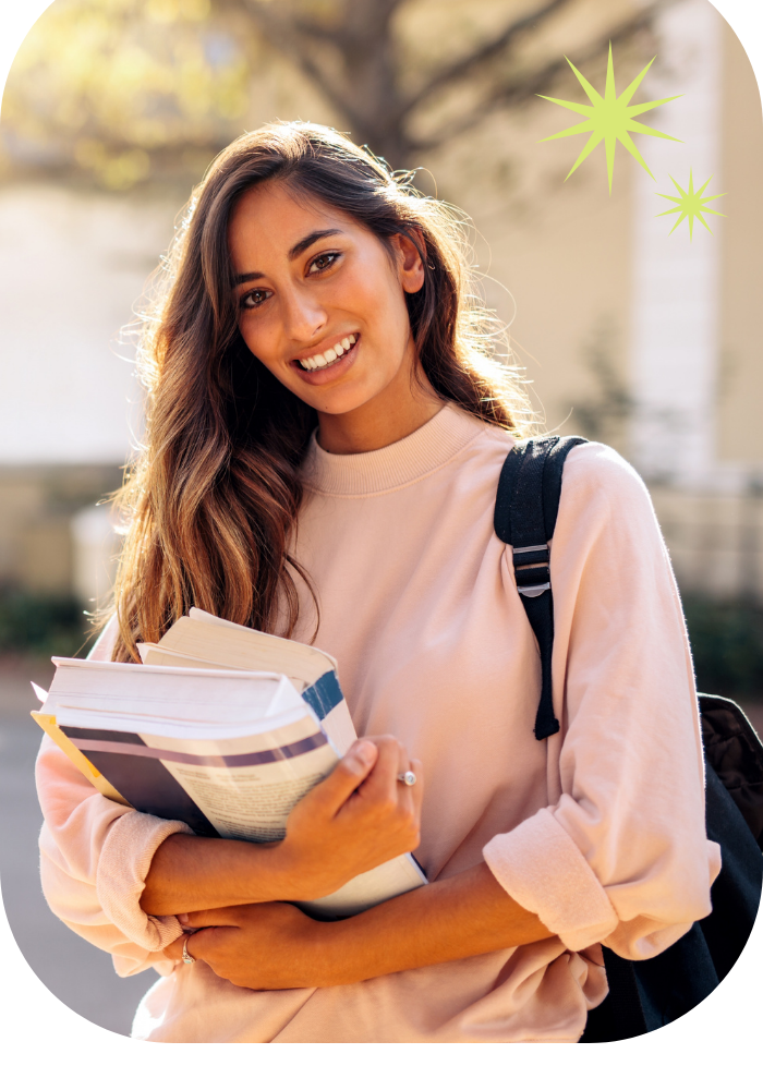 Female student holding books Female student holding books
